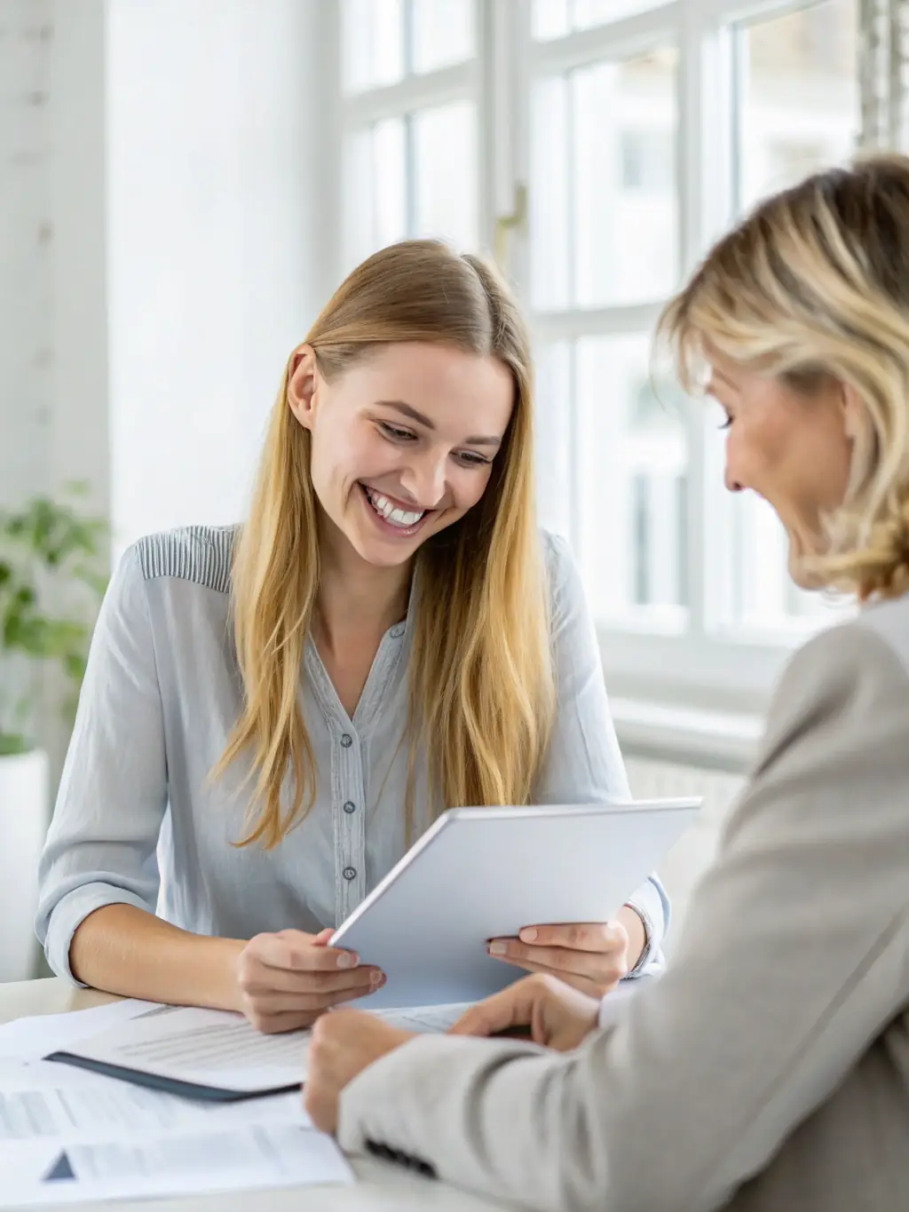 A person working with a financial advisor to create a budget and financial plan, symbolizing the planning and strategy development phase.